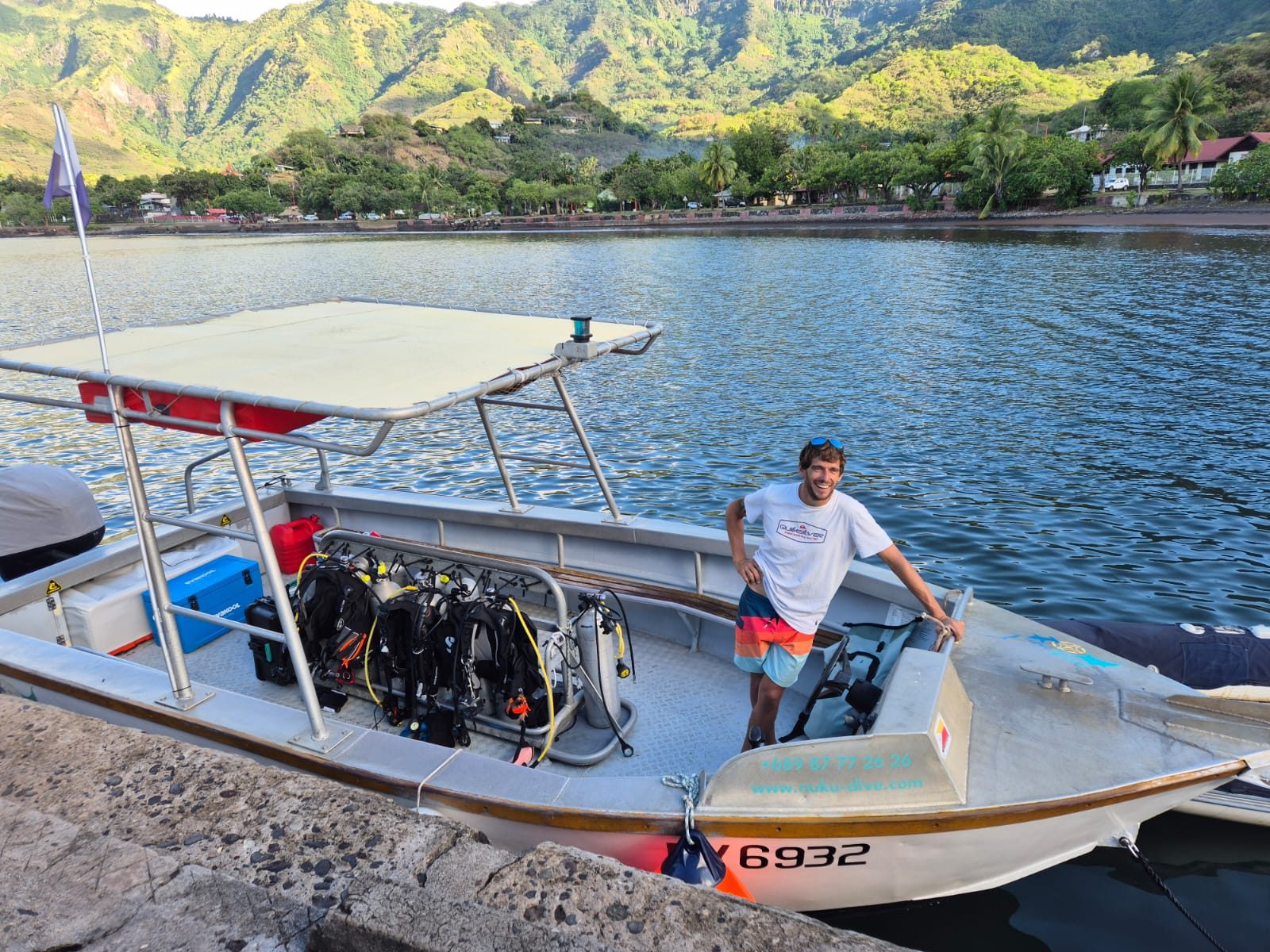 Gaël on board the boat at the quay, tanks loaded