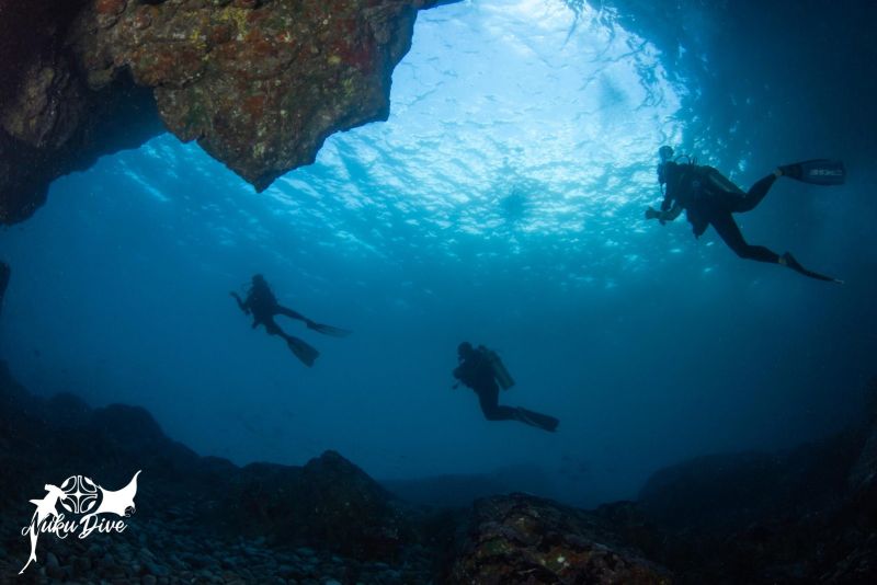Divers in the Matateteiko cave